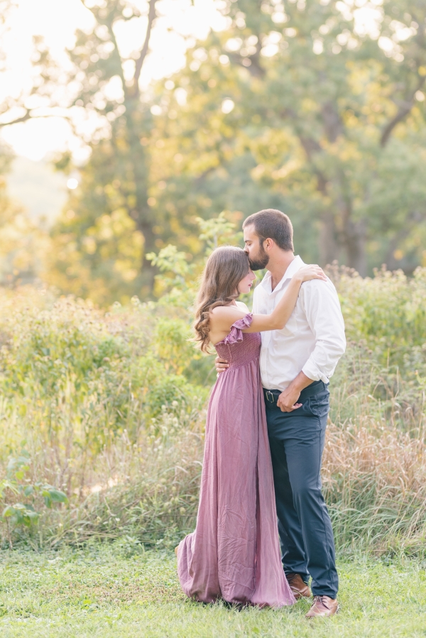 Engaged couple posed for an engagement session at Fabyan Forest Preserve