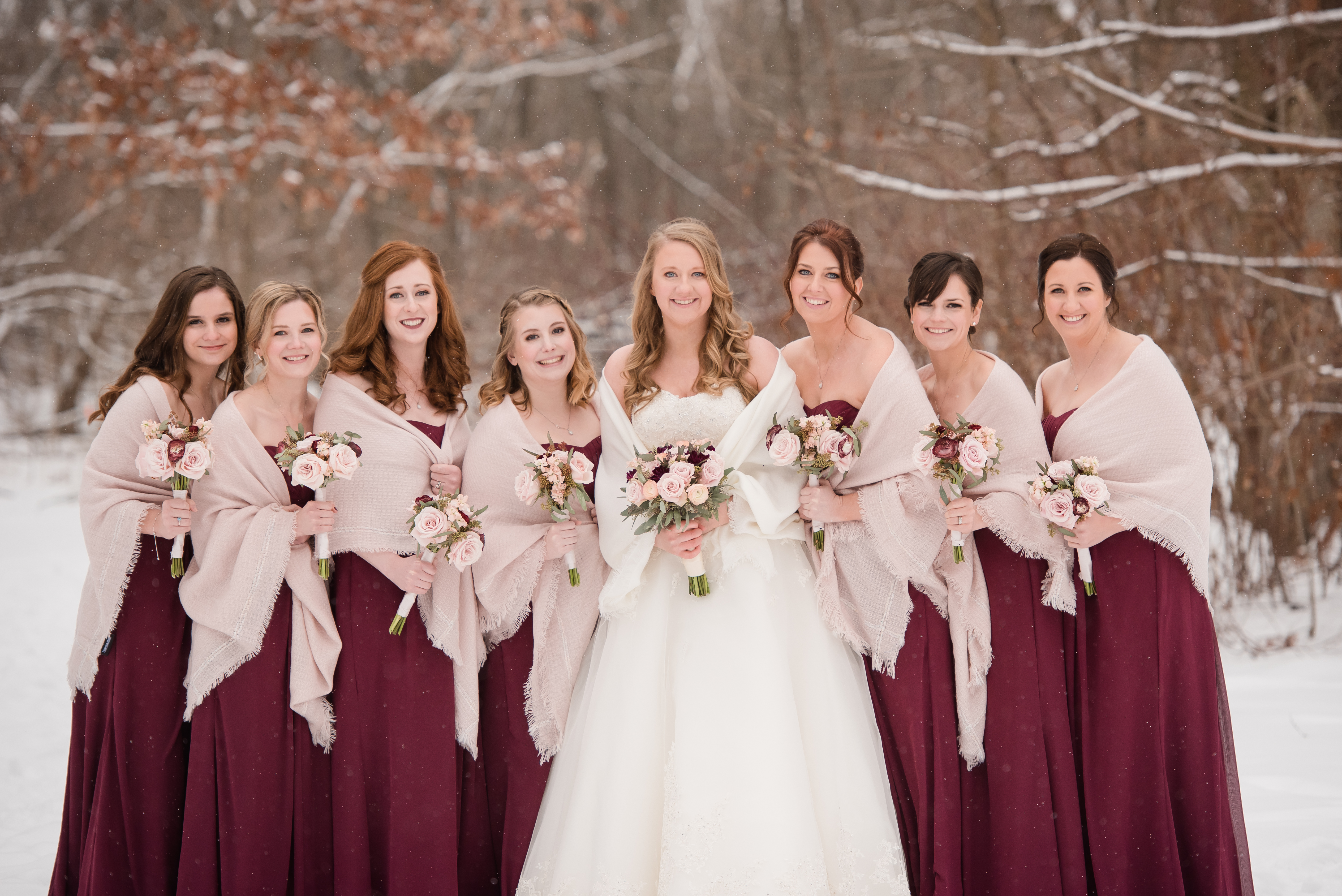Winter wedding in Illinois with snow falling