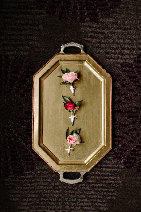 Boutonnieres on Gold Tray