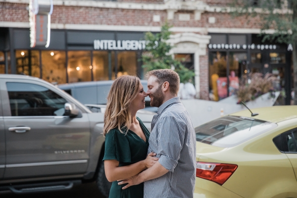 Couple in front of city street