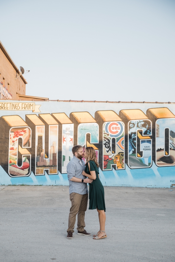 Couple in front of Chicago mural
