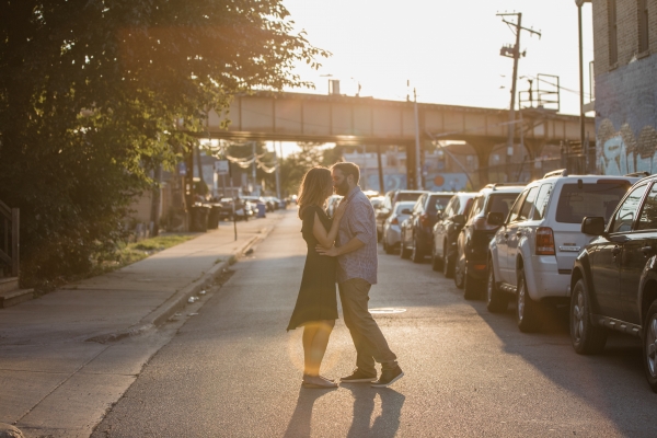 Couple kissing on city street