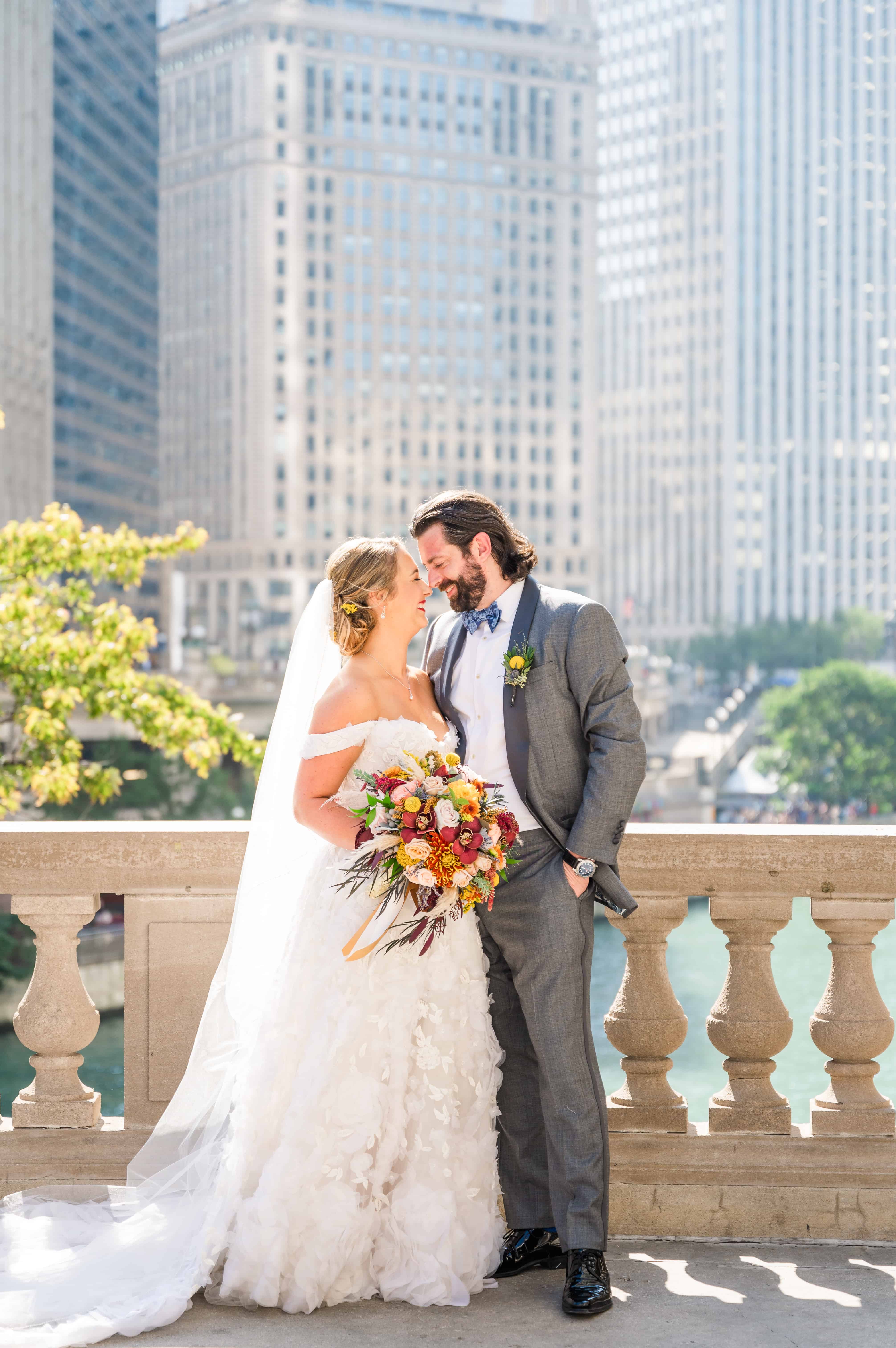 Sunny wedding portrait at the wrigley building in downtown Chicago
